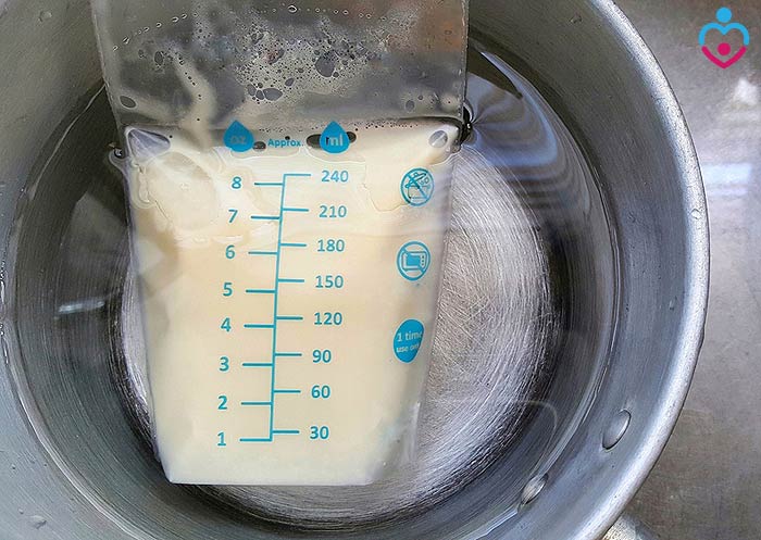 Manual breast milk thawing